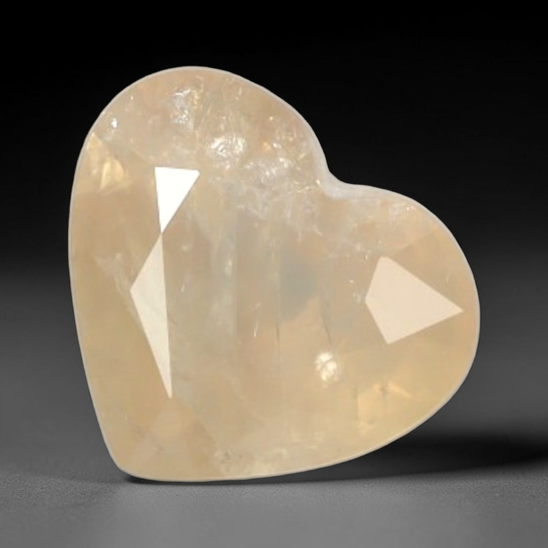 Certified 3.05 Carats Pinkish Orange Natural Ceylon Sapphire Single Heart Faceted Gemstone, LZ853: This single heart faceted natural sapphire exhibits rich, well-balanced pinkish orange color saturation with dynamic light reflection across its 8.13 mm x 9.41 mm x 5.35 mm dimensions, its symmetrical