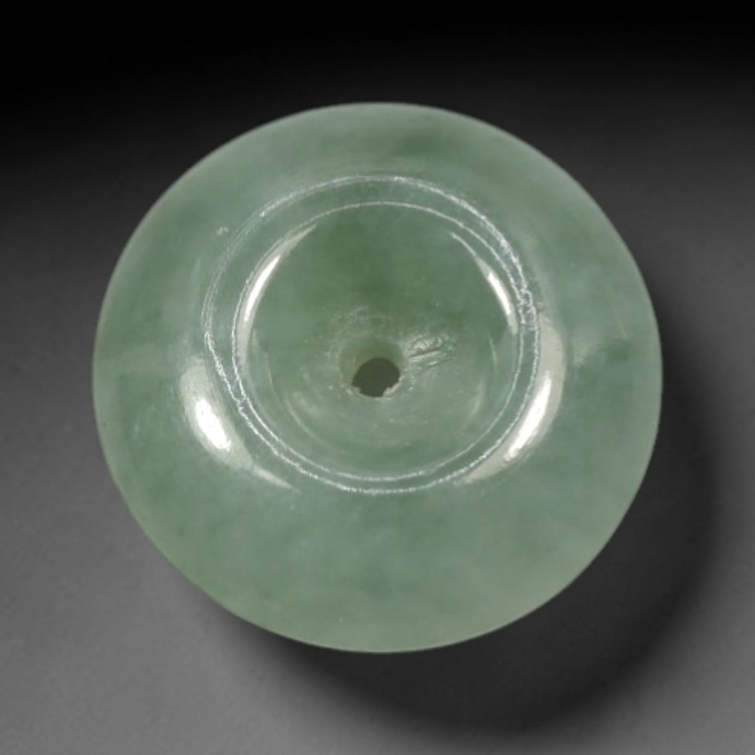 10.36 Carats Natural Burmese Type A Jadeite Jade Donut Pendant, 7XN: I've got a lovely smooth jade donut here to show you, classic timeless shape with soft calming color that's easy on the eye! It holds a gentle muted pale celadon green tone, semi-translucent with fain