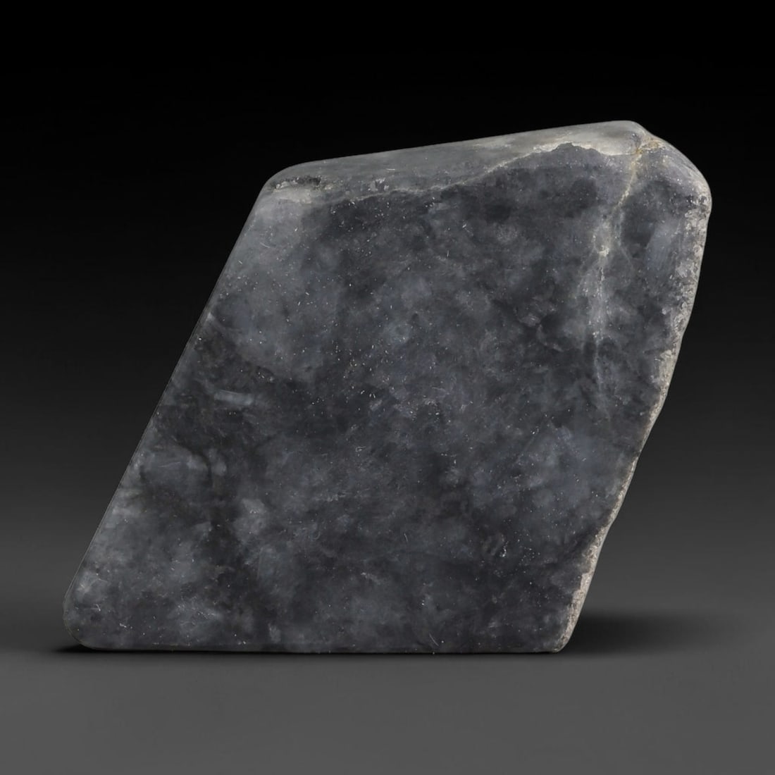 210ct Natural Type A Burmese Jadeite Jade Sliced Rough, 40YR: This specimen is a sliced rough block of natural Type A Burmese jadeite jade. The interior displays natural colour zoning with visible mineral veining and crystalline patterns typical of unprocessed j