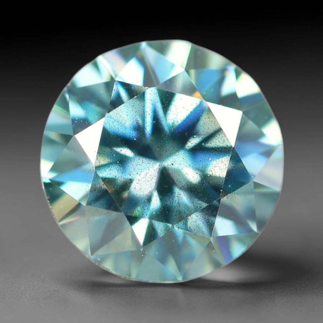 0.78 Carats Aqua Toned Moissanite Loose Gemstone, 56WP: This moissanite features dimensional measurements of 6x3.7mm, lab-grown silicon carbide material valued for superior light refraction that delivers vivid multi-hued sparkle across all lighting conditi