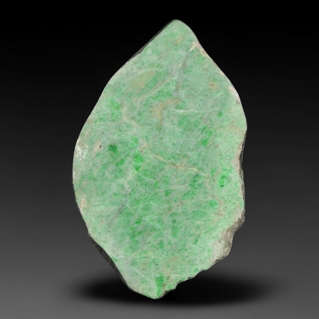 151ct Natural Type A Burmese Jadeite Jade Sliced Rough, 63YN: This specimen is a sliced rough block of natural Type A Burmese jadeite jade. The interior displays natural colour zoning with visible mineral veining and crystalline patterns typical of unprocessed j