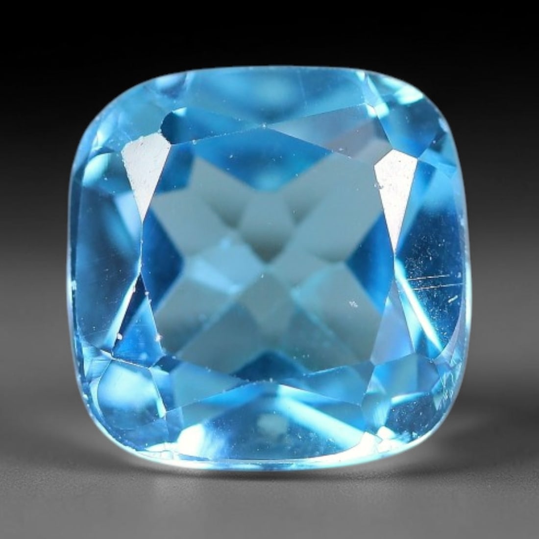 2.58 Carats Natural Swiss Blue Topaz Loose Gemstone, 11WP: This genuine natural swiss blue topaz displays consistent saturated blue coloration inherent to unprocessed natural mineral specimens. Formed through natural geological formation, the stone carries su