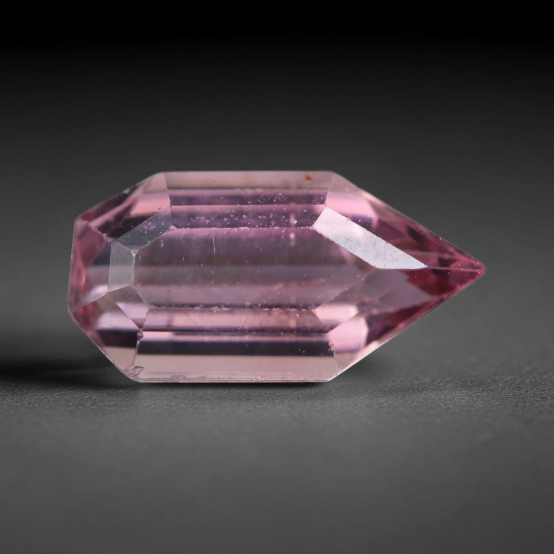 1.61 Carats Natural Soft Pink Tourmaline Fancy Elongated Faceted Loose Gemstone, 54WS: This unique fancy elongated faceted tourmaline showcases gentle soft pink color shimmering through smooth polished step facets, with tiny natural micro specks and faint fine internal lines visible wit