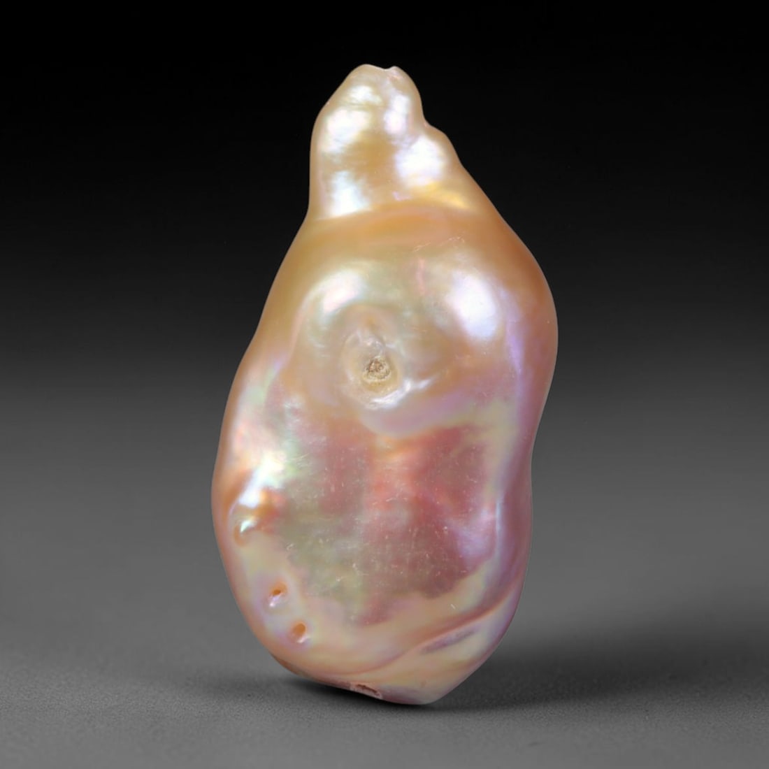 Natural Freshwater Keshi Pearl Baroque Loose Pearl, 92WE: This natural freshwater keshi pearl presents an organic irregular baroque silhouette with rich shifting iridescent nacre displaying soft champagne, peach and lavender overtones across its surface. Sub
