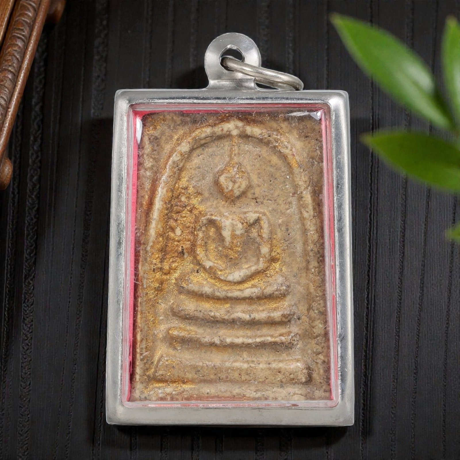 Thai Phra Somdej Amulet - Silver Tone Pendant, 56ZB: A Thai Buddhist Phra Somdej amulet featuring a seated Buddha figure on tiered bases, housed in a plain silver-tone metal casing with a glass-fronted enclosure. The amulet plaque displays gilded accent
