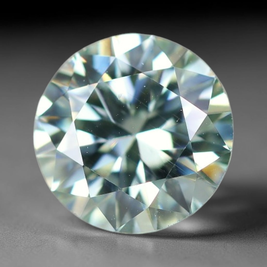 1.72 Carats Aqua Toned Moissanite Loose Gemstone, 74WP: This moissanite features dimensional measurements of 7.8x4.7mm, lab-grown silicon carbide material valued for superior light refraction that delivers vivid multi-hued sparkle across all lighting condi