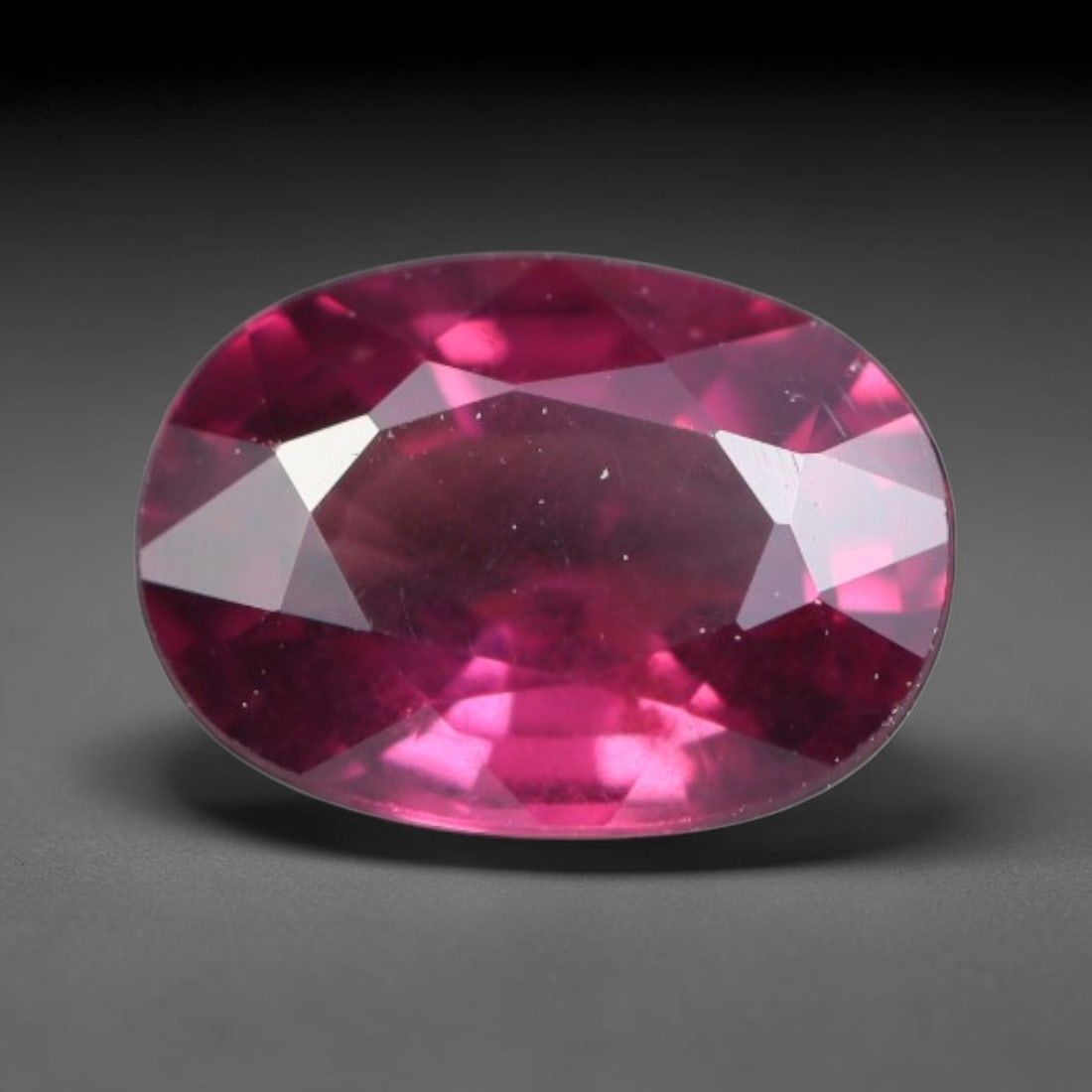 1.11 Carats Natural Rich Magenta Red Garnet Oval Faceted Loose Gemstone, 35WW: This garnet originates from natural geological mineral deposits and undergoes precise faceting and high-gloss reflective polishing via professional lapidary craftsmanship. Minute pinpoint mineral spec