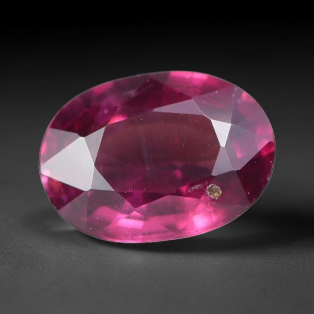 1.01 Carats Natural Rich Magenta Red Garnet Oval Faceted Loose Gemstone, 40WW: This garnet originates from natural geological mineral deposits and undergoes precise faceting and high-gloss reflective polishing via professional lapidary craftsmanship. Minute pinpoint mineral spec