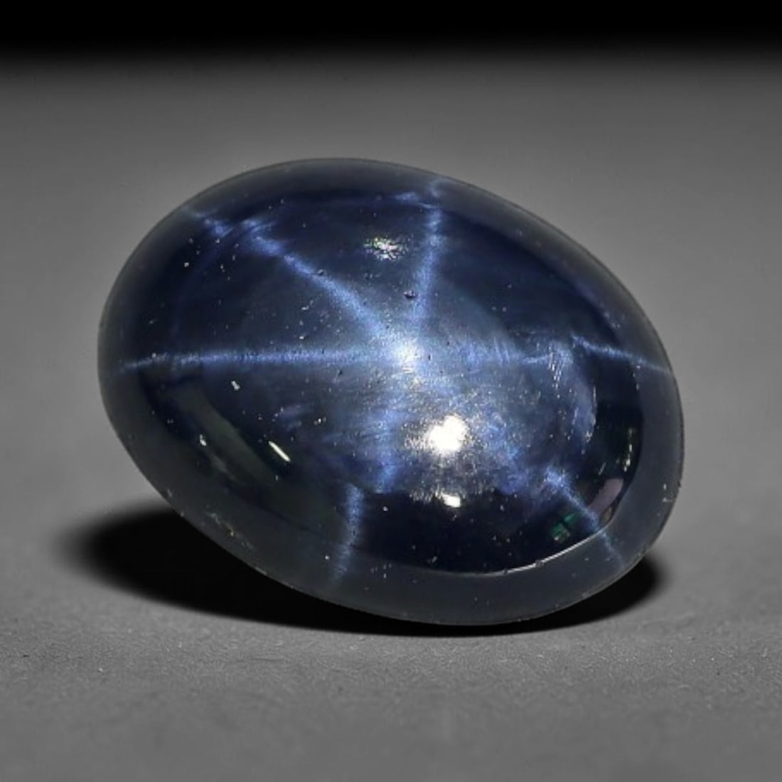 2.51 Carats Natural 6 Ray Blue Star Sapphire Loose Gemstone, 49XX: This star sapphire is crafted from natural corundum deposits and refined into a sleek polished cabochon form through professional lapidary finishing procedures. The distinct six-ray star asterism disp