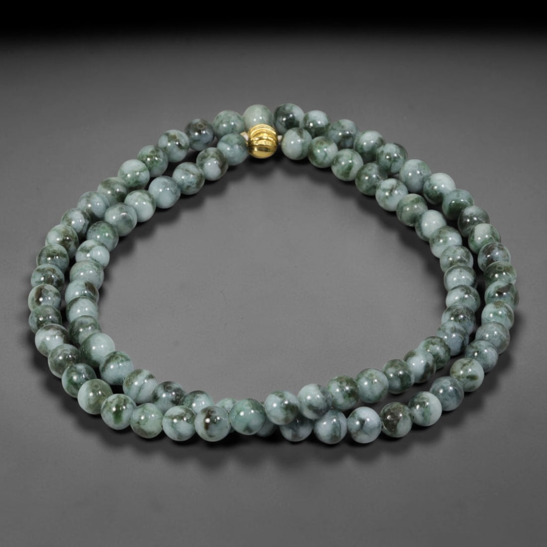 Natural Burmese Type A Floating Flower Jadeite Jade Beaded Necklace, 21WY: Formed from untreated Burmese Type A jadeite material, each spherical bead carries naturally formed floating mineral inclusions scattered evenly throughout the stone structure, finished with refined u
