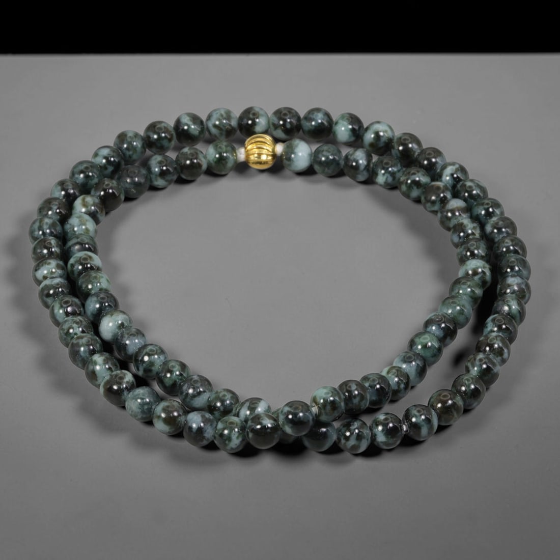 Natural Burmese Type A Ink Black Floating Jadeite Jade Beaded Necklace, 29WY: Fabricated from genuine Burmese Type A jadeite featuring natural ink black floating mineral tones distributed organically within the stone matrix, each bead receives uniform lapidary polishing for a s