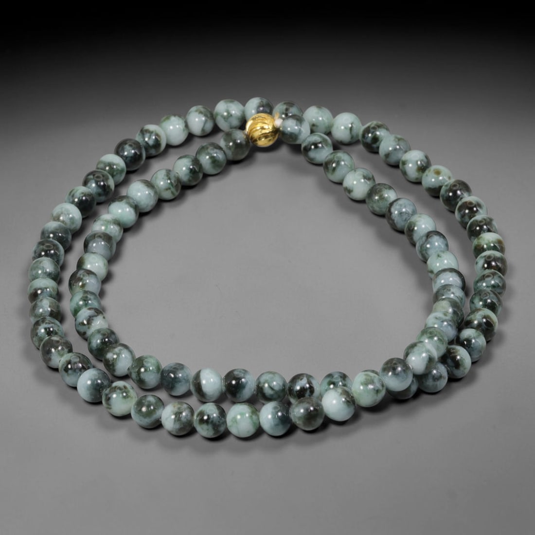 Natural Burmese Type A Floating Flower Jadeite Jade Beaded Necklace, 24WY: Formed from untreated Burmese Type A jadeite material, each spherical bead carries naturally formed floating mineral inclusions scattered evenly throughout the stone structure, finished with refined u