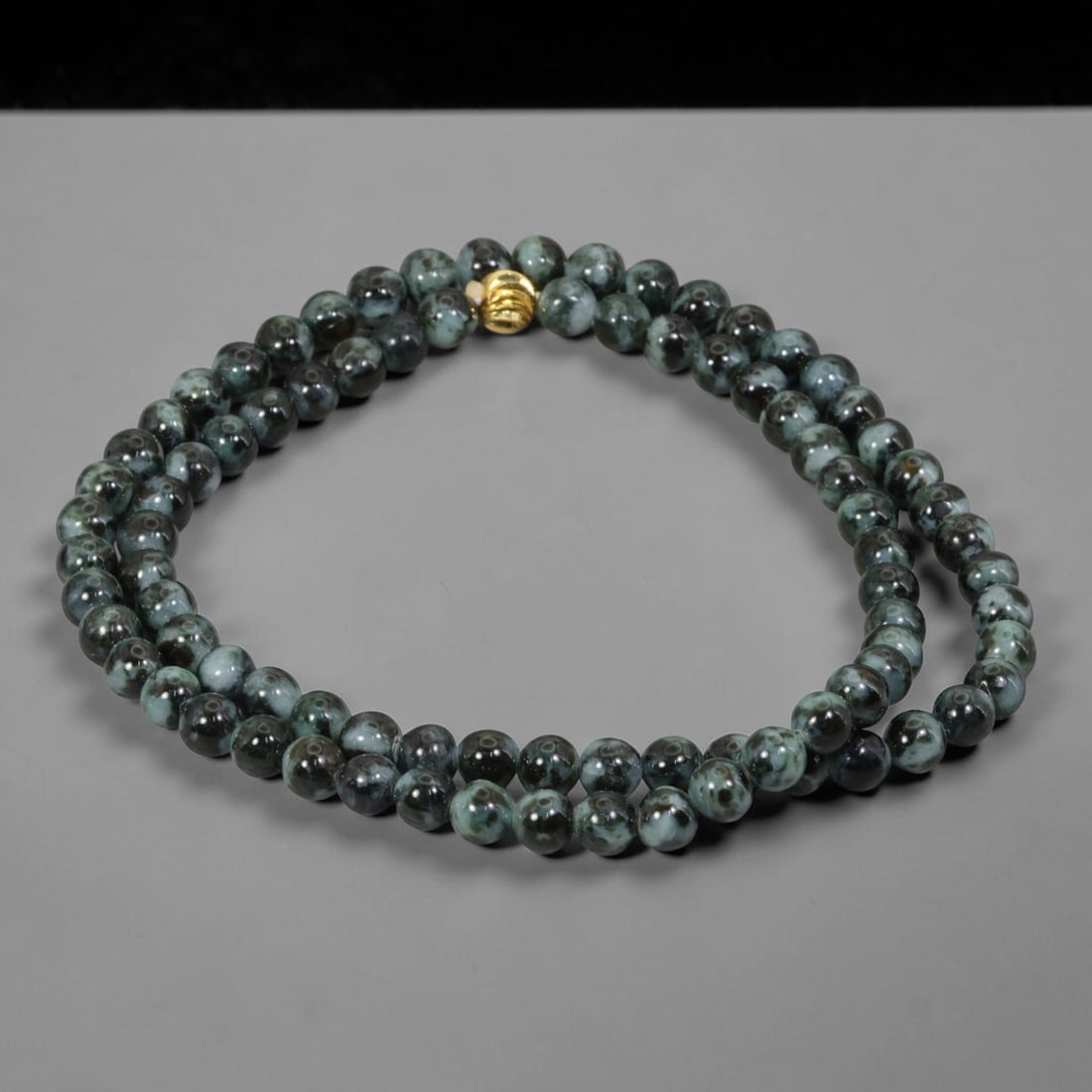 Natural Burmese Type A Ink Black Floating Jadeite Jade Beaded Necklace, 31WY: Fabricated from genuine Burmese Type A jadeite featuring natural ink black floating mineral tones distributed organically within the stone matrix, each bead receives uniform lapidary polishing for a s