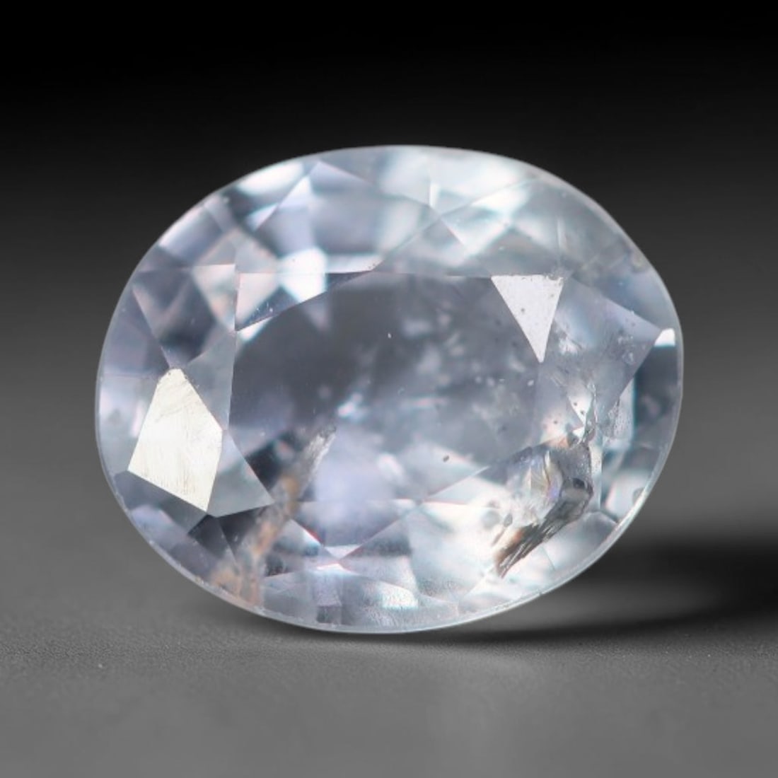 0.52 Carats Natural Clear Pale White Loose Faceted Sapphire Gemstone, 5XM: Natural transparent pale white corundum sapphire finely faceted loose gemstone, brilliant cut design maximizes light sparkle and delivers a clean, neutral clear body tone with faint subtle cool undert