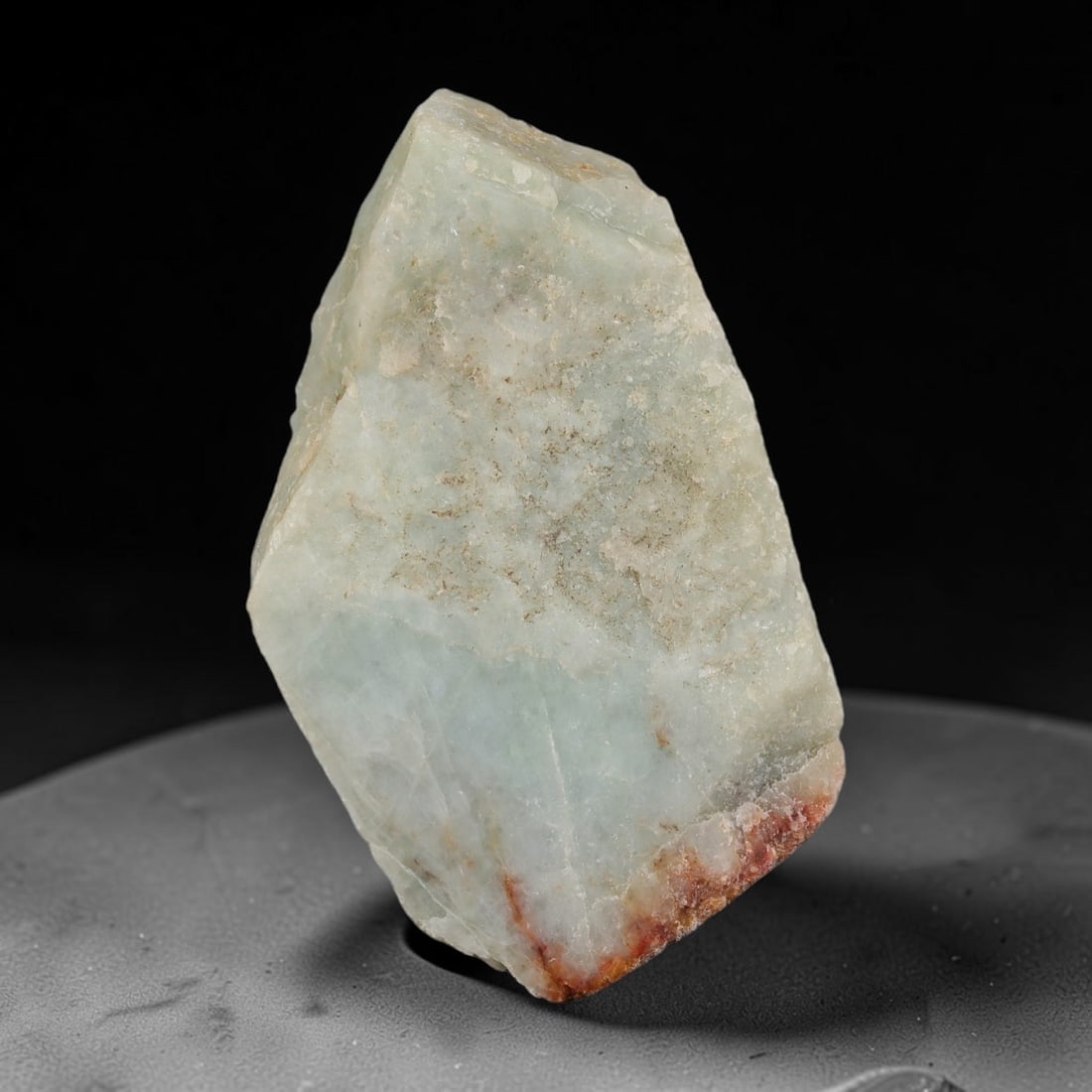 167ct Natural Type A Burmese Jadeite Jade Sliced Rough, 47YR: This specimen is a sliced rough block of natural Type A Burmese jadeite jade. The interior displays natural colour zoning with visible mineral veining and crystalline patterns typical of unprocessed j