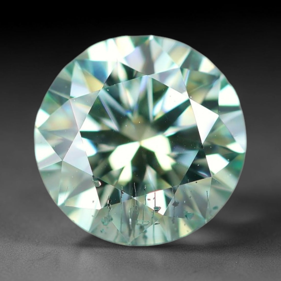 0.95 Carats Aqua Toned Moissanite Loose Gemstone, 67WP: This moissanite features dimensional measurements of 6.3x3.9mm, lab-grown silicon carbide material valued for superior light refraction that delivers vivid multi-hued sparkle across all lighting condi