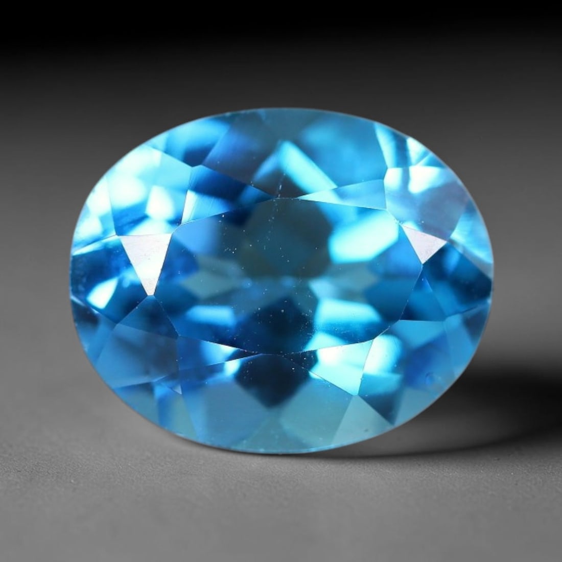 4.23 Carats Natural Swiss Blue Topaz Loose Gemstone, 97WJ: This genuine natural swiss blue topaz displays consistent saturated blue coloration inherent to unprocessed natural mineral specimens. Formed through natural geological formation, the stone carries su