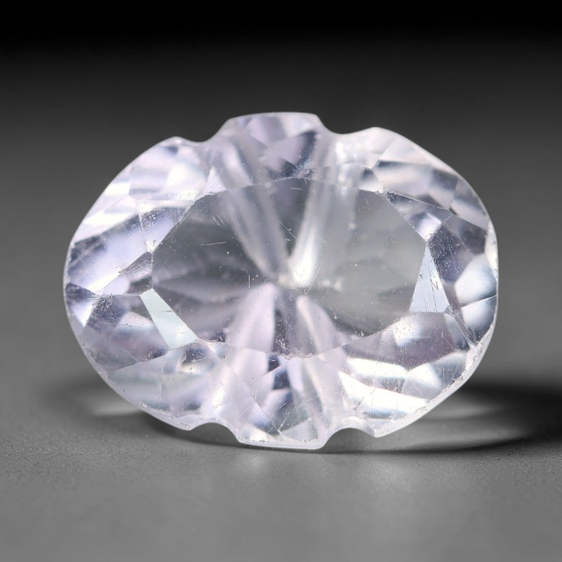 4.19 Carats Natural Pale Lavender Oval Amethyst Loose Faceted Gemstone, 92XV: Natural soft pale lavender amethyst quartz expertly cut into a unique scalloped oval faceted loose gemstone, designed with mixed brilliant facets to deliver soft diffused light sparkle. The crystal fe