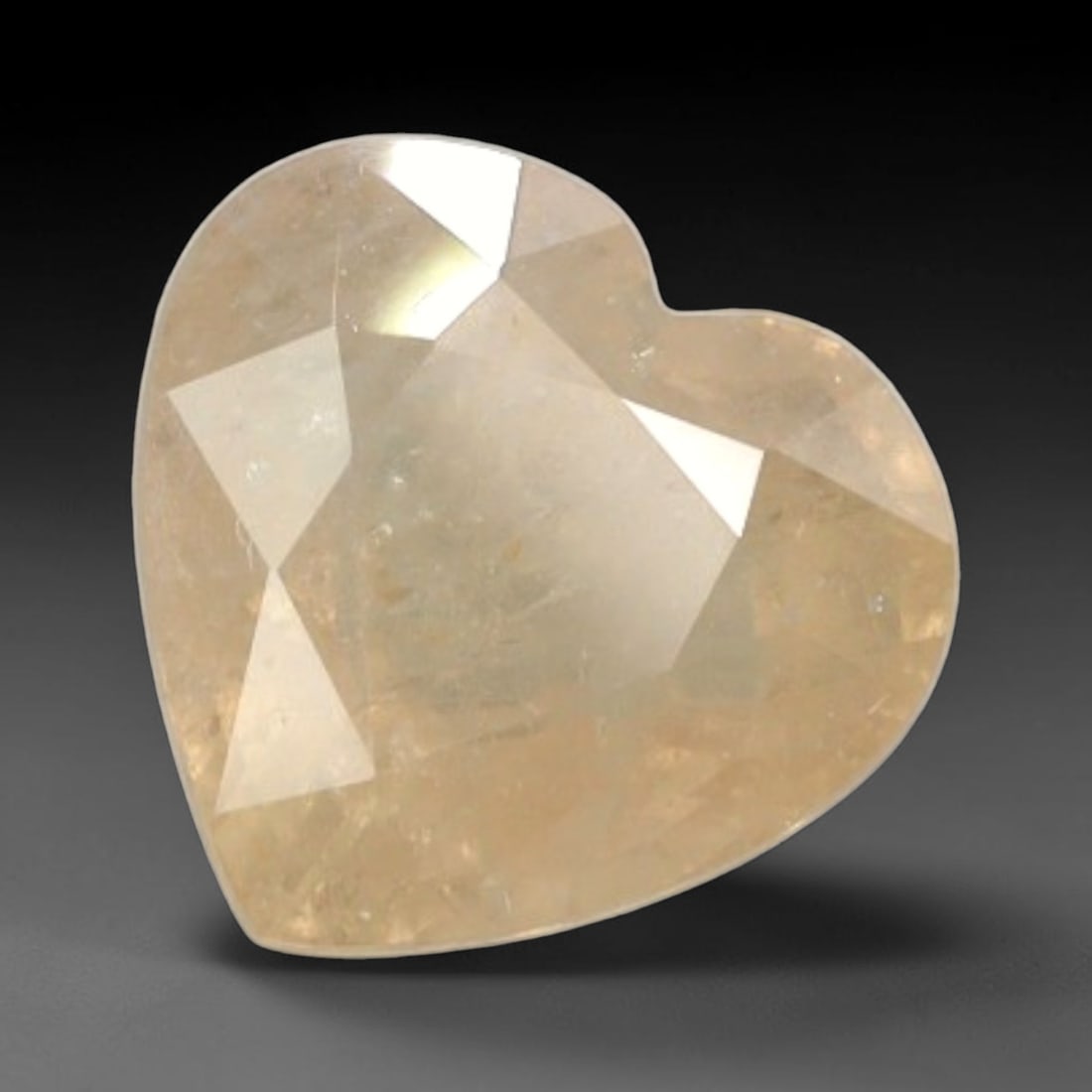 Certified 4.29 Carats Pinkish Orange Natural Ceylon Sapphire Single Heart Faceted Gemstone, LZ857: This single heart faceted natural sapphire delivers vivid pinkish orange saturation with lively internal light dispersion across its 9.49 mm x 9.95 mm dimensions, crafted with balanced faceting to max