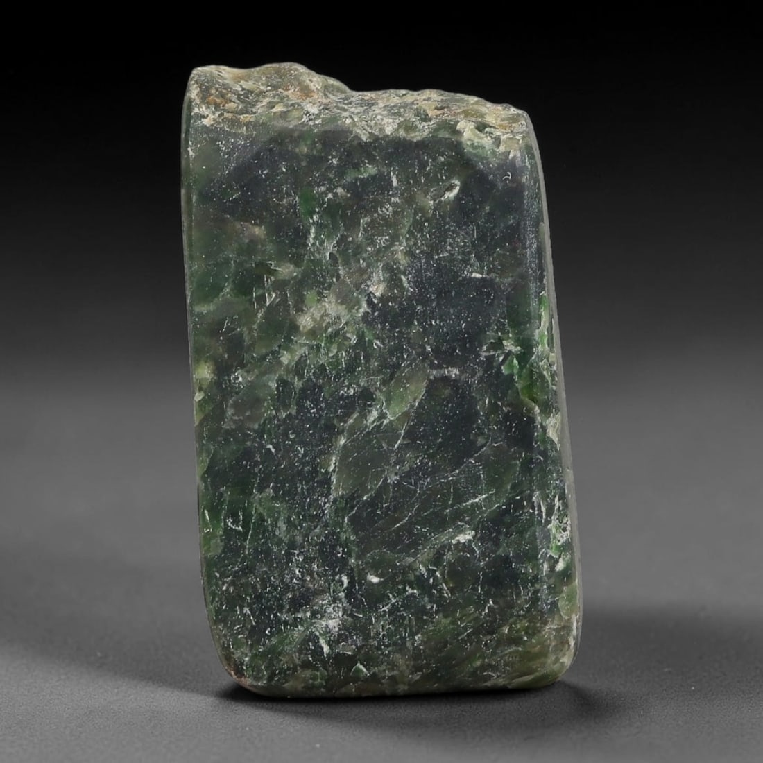 178ct Natural Type A Burmese Jadeite Jade Sliced Rough, 59YR: This specimen is a sliced rough block of natural Type A Burmese jadeite jade. The interior displays natural colour zoning with visible mineral veining and crystalline patterns typical of unprocessed j