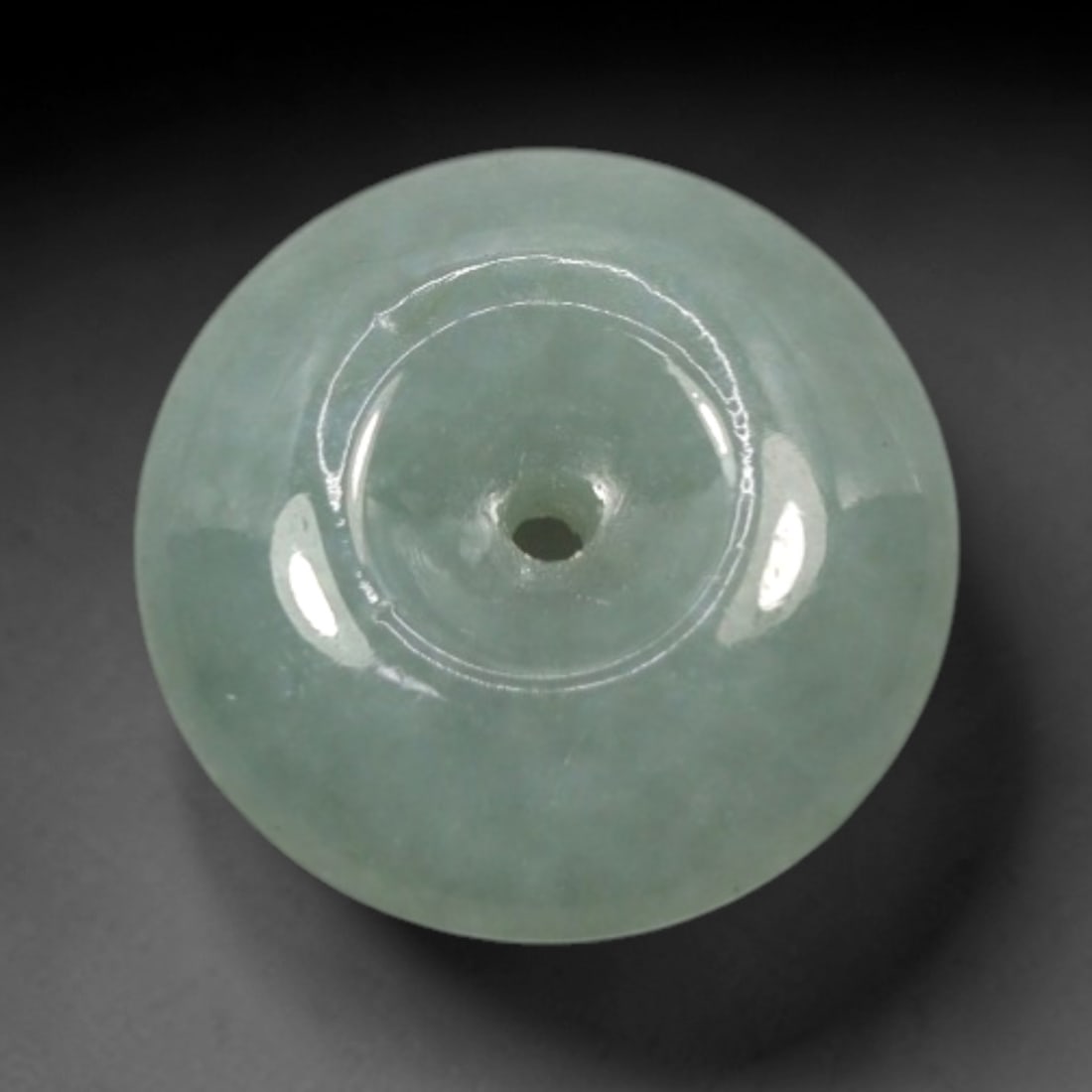10.28 Carats Natural Burmese Type A Jadeite Jade Donut Pendant, 1XN: I've got a lovely smooth jade donut here to show you, classic timeless shape with soft calming color that's easy on the eye! It holds a gentle muted pale celadon green tone, semi-translucent with fain