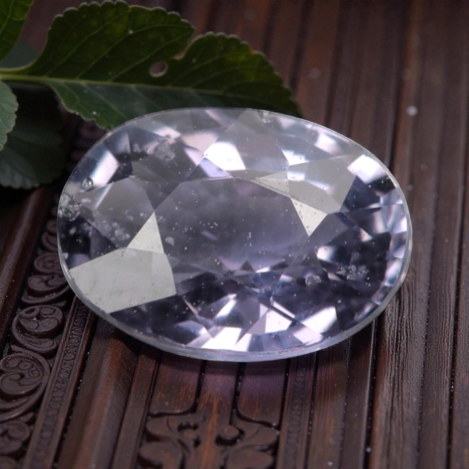 1.00 Carats Purple Violetish Sapphire - Natural Loose Gemstone, LZ278: This refined oval mixed-cut sapphire captivates with a delicate purple hue infused with soft violetish undertones, creating a luminous, ethereal appearance reminiscent of twilight skies and lavender b