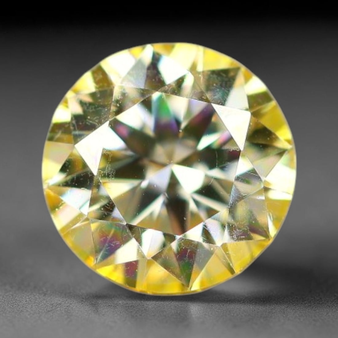 0.97 Carats Yellow Moissanite Loose Gemstone, 27WP: This yellow moissanite features dimensions of 6.4x4mm, crafted from high performance silicon carbide material famous for exceptional light refraction and brilliant light dispersion that creates intens