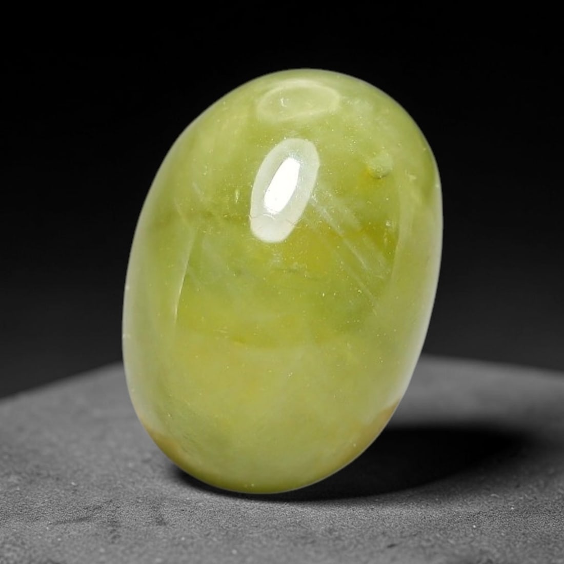 3.95 Carats Natural Madagascar Greenish Yellow Sapphire Cabochon Loose Gemstone, 30XX: Formed from natural corundum sourced from Madagascar geological deposits, this raw mineral material is processed into a polished cabochon form through professional stone finishing techniques with a sm