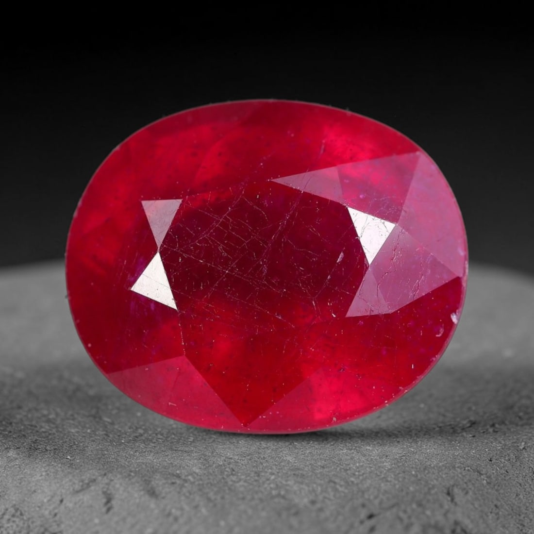 8.30 Carats Natural Madagascar Ruby Oval Faceted Loose Gemstone, 7WS: This substantial natural Madagascar ruby is fashioned in an oval brilliant faceted cut, exhibiting vivid deep crimson red saturation typical of Malagasy corundum sources. Widespread natural internal s