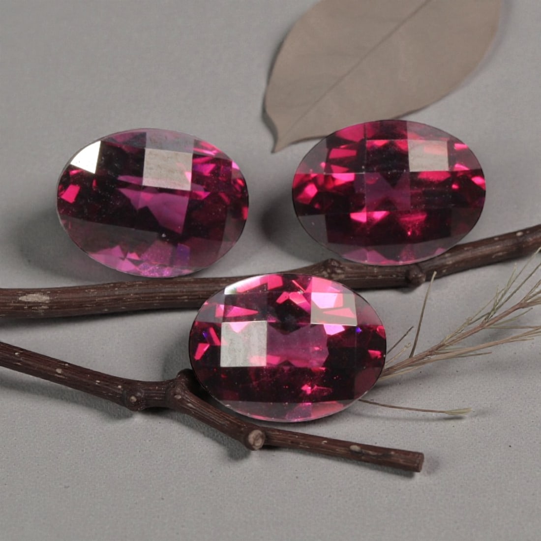 4.81ct Natural Raspberry Pink Oval Garnet Loose Faceted Gemstone, 14YG: This natural oval faceted garnet weighs 4.81 carats with exact dimensions of 7.9x6.0x4.7mm. It features an intensely saturated deep raspberry magenta-pink hue, layered with rich wine-red undertones th