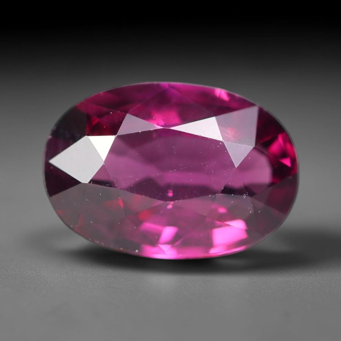 2.07 Carats Natural Deep Burgundy Red Garnet Oval Faceted Loose Gemstone, 68WY: This timeless oval faceted garnet boasts a luxuriously deep burgundy red tone that glows with vivid crimson fire across its precisely polished reflective facets. Fine natural micro mineral specks are 