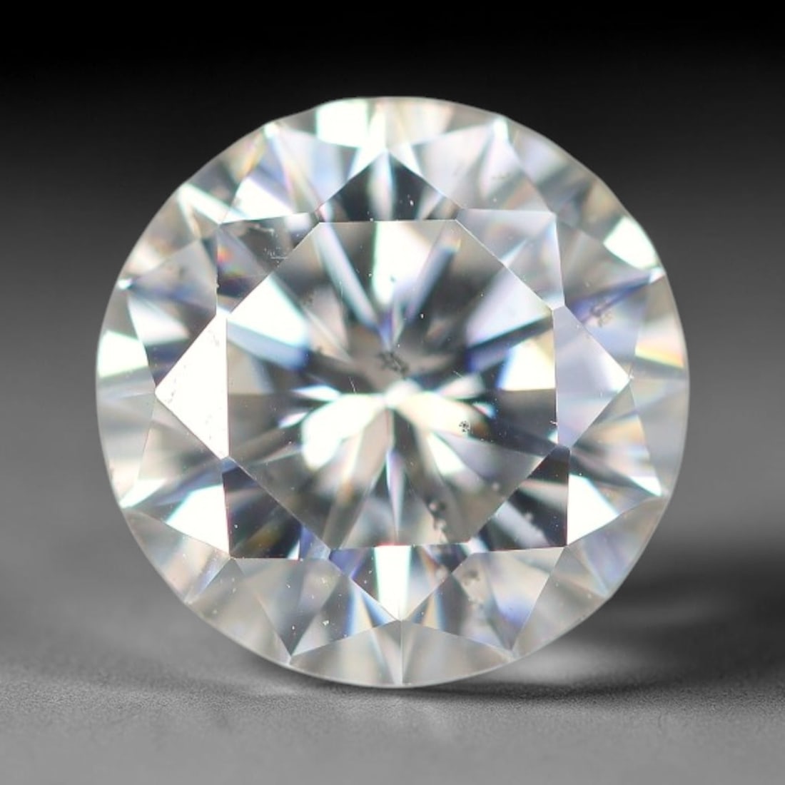 0.95 Carats Aqua Toned Moissanite Loose Gemstone, 64WP: This moissanite features dimensional measurements of 6.5x3.9mm, lab-grown silicon carbide material valued for superior light refraction that delivers vivid multi-hued sparkle across all lighting condi