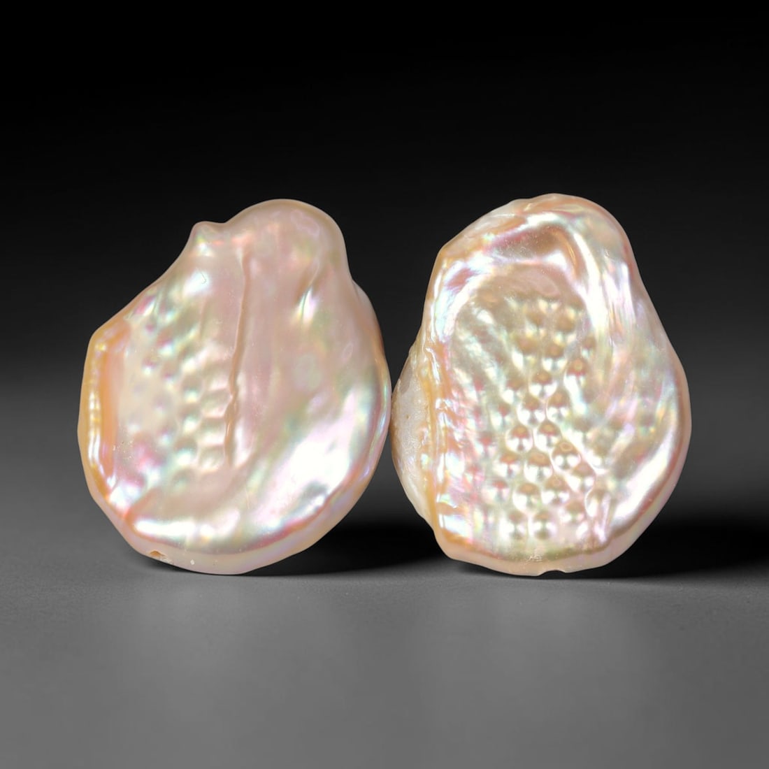 19.33ct Matched Pair Natural Freshwater Baroque Coin Pearls Loose Gemstones, 53XZ: Stunning matched pair of natural freshwater baroque coin pearls, each showcasing organic freeform flattened silhouettes with distinctive textured bumpy nacre surfaces that catch shifting light. The pe