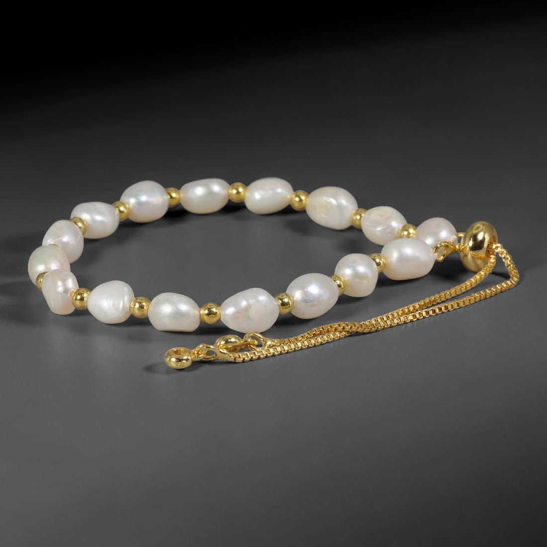 Natural Freshwater Pearl Bracelet - Baroque White Pearl Strand, 98YM: Composed of organic baroque natural freshwater pearls bearing bright creamy white iridescent luster, each bead showcasing asymmetrical natural contours formed through unaltered freshwater pearl growth