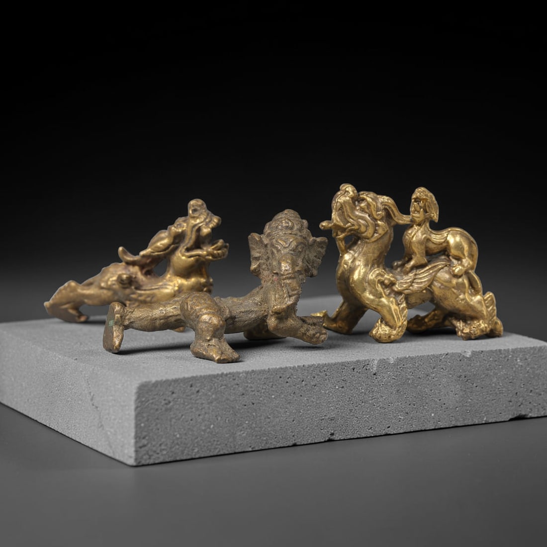 Vintage Thai Copper Alloy Animal Amulet Set - Three Miniature Figurines, 100ZB: A matched set of three miniature cast copper alloy talismans originating from Thai folk craft tradition, each measuring approximately 3 cm in length and 1 cm in width. The group features distinct myth