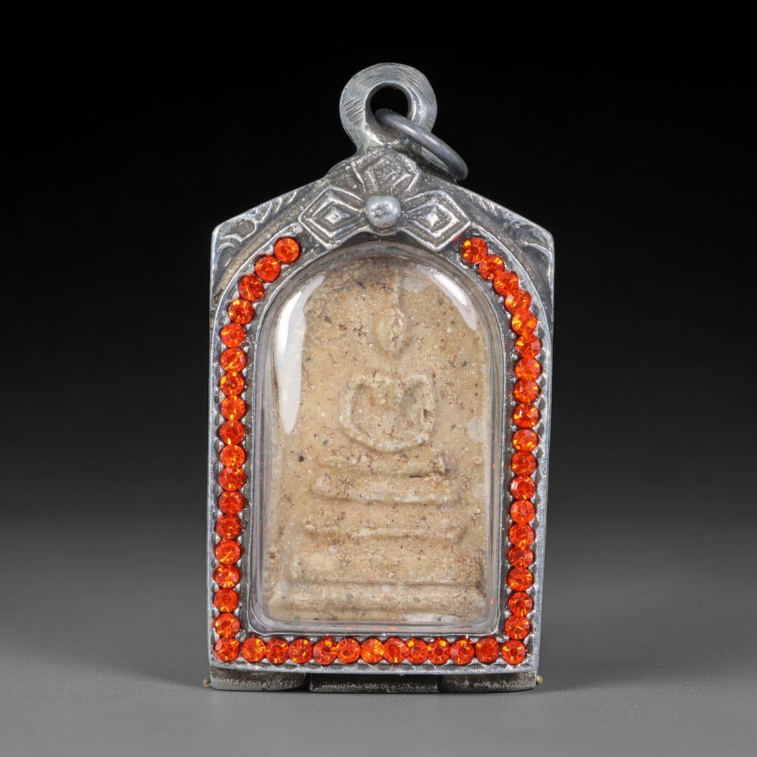 Thai Gilded Clay Metal Amulet Buddhist Votive Pendant, 29ZB: Formed from fired clay with applied gilded surface layers, the piece uses traditional molding techniques characteristic of Southeast Asian devotional craft. The construction adheres to standard region