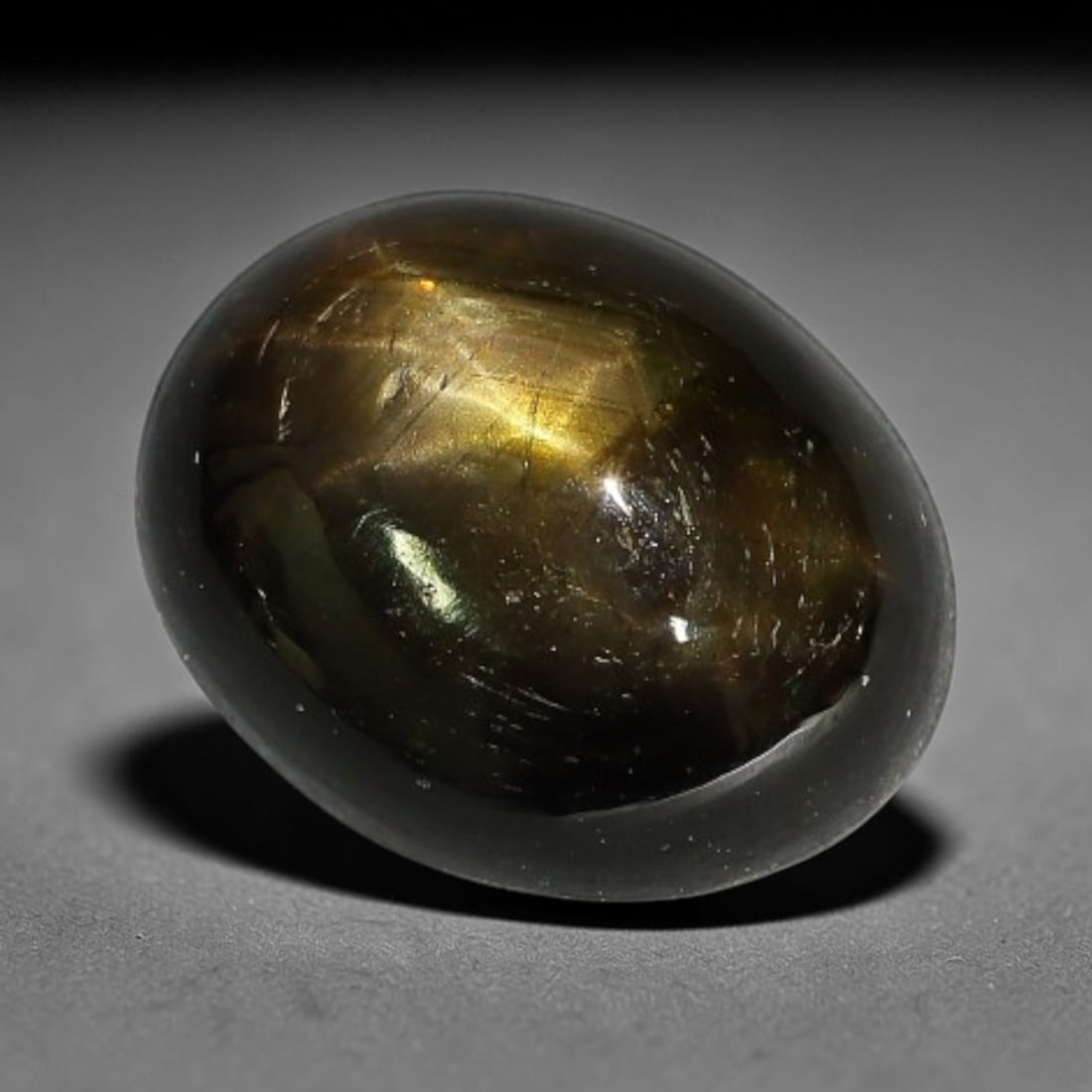 5.00ct Natural Siamese 6-Ray Black Star Sapphire Loose Gemstone, 65WW: This polished star sapphire originates from classic Siamese mining deposits, featuring a deep dark crystalline base with fine native mineral traces trapped within its structure, sized at calibrated 10