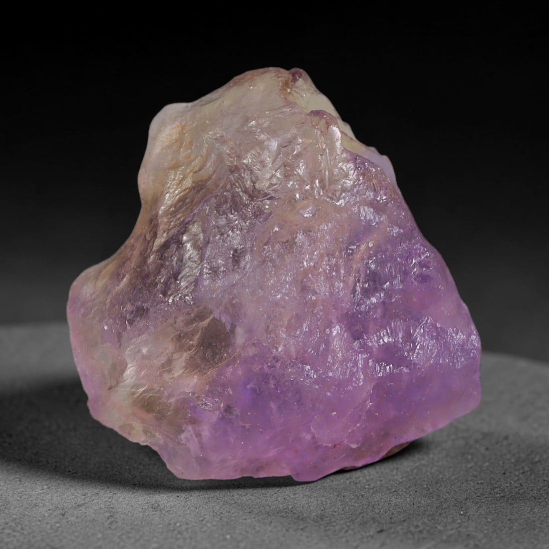 46.08 Carats Natural Bi-Color Ametrine Raw Rough Crystal Chunk, 78YR: This genuine natural ametrine rough showcases a seamless blend of soft lavender amethyst and pale golden citrine hues formed within a single quartz crystal. Delicate rusty orange mineral inclusions an
