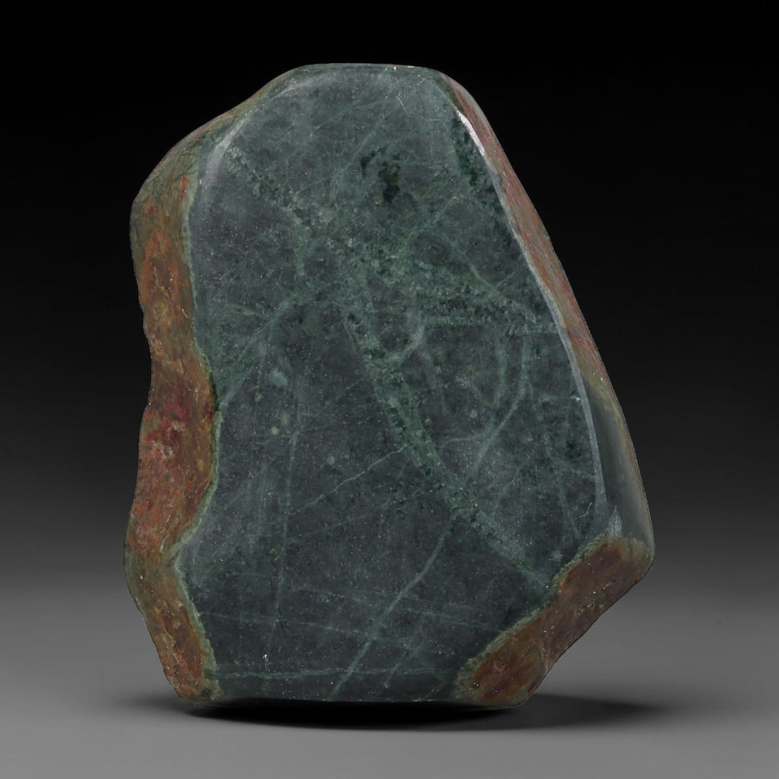 325ct Natural Type A Burmese Jadeite Jade Sliced Rough, 22YR: This specimen is a sliced rough block of natural Type A Burmese jadeite jade. The interior displays natural colour zoning with visible mineral veining and crystalline patterns typical of unprocessed j