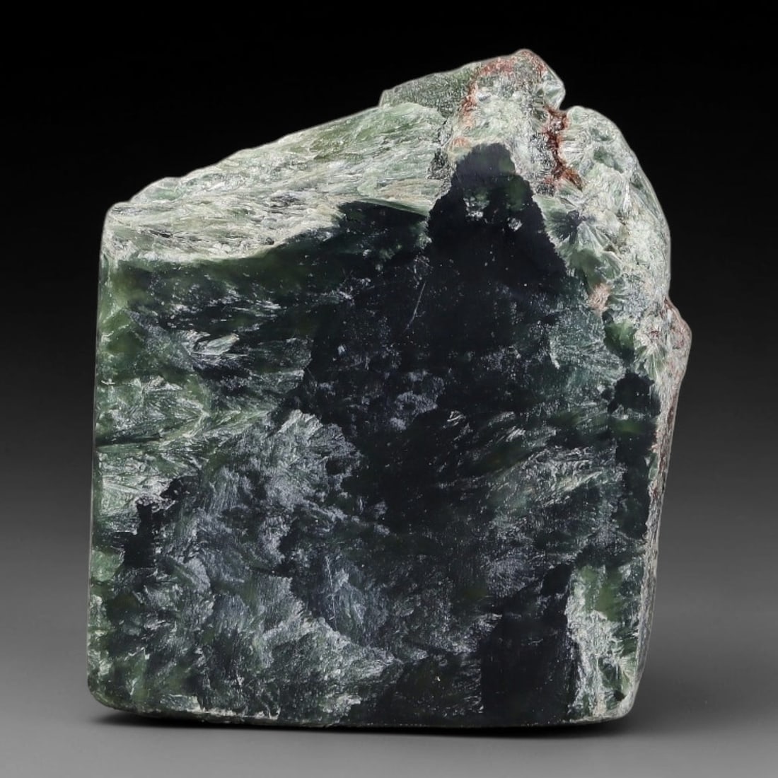 46ct Natural Siberian Seraphinite Polished Rough Slab, 16WV: This polished mineral slab is natural seraphinite originating from Siberian deposits, displaying characteristic radiating crystalline fibrous formations with layered deep forest and silvery green band