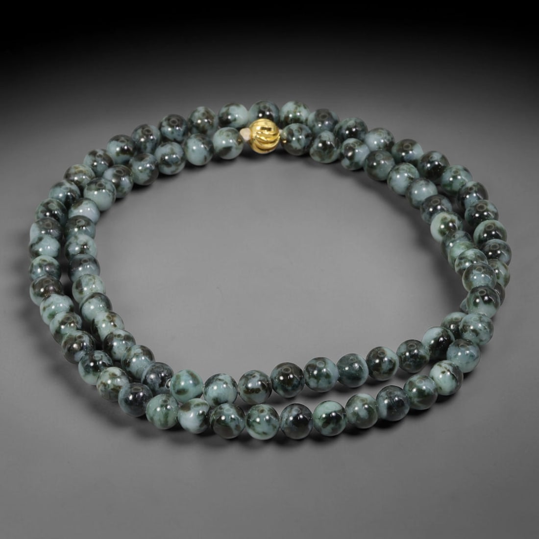 Natural Burmese Type A Ink Black Floating Jadeite Jade Beaded Necklace, 34WY: Fabricated from genuine Burmese Type A jadeite featuring natural ink black floating mineral tones distributed organically within the stone matrix, each bead receives uniform lapidary polishing for a s