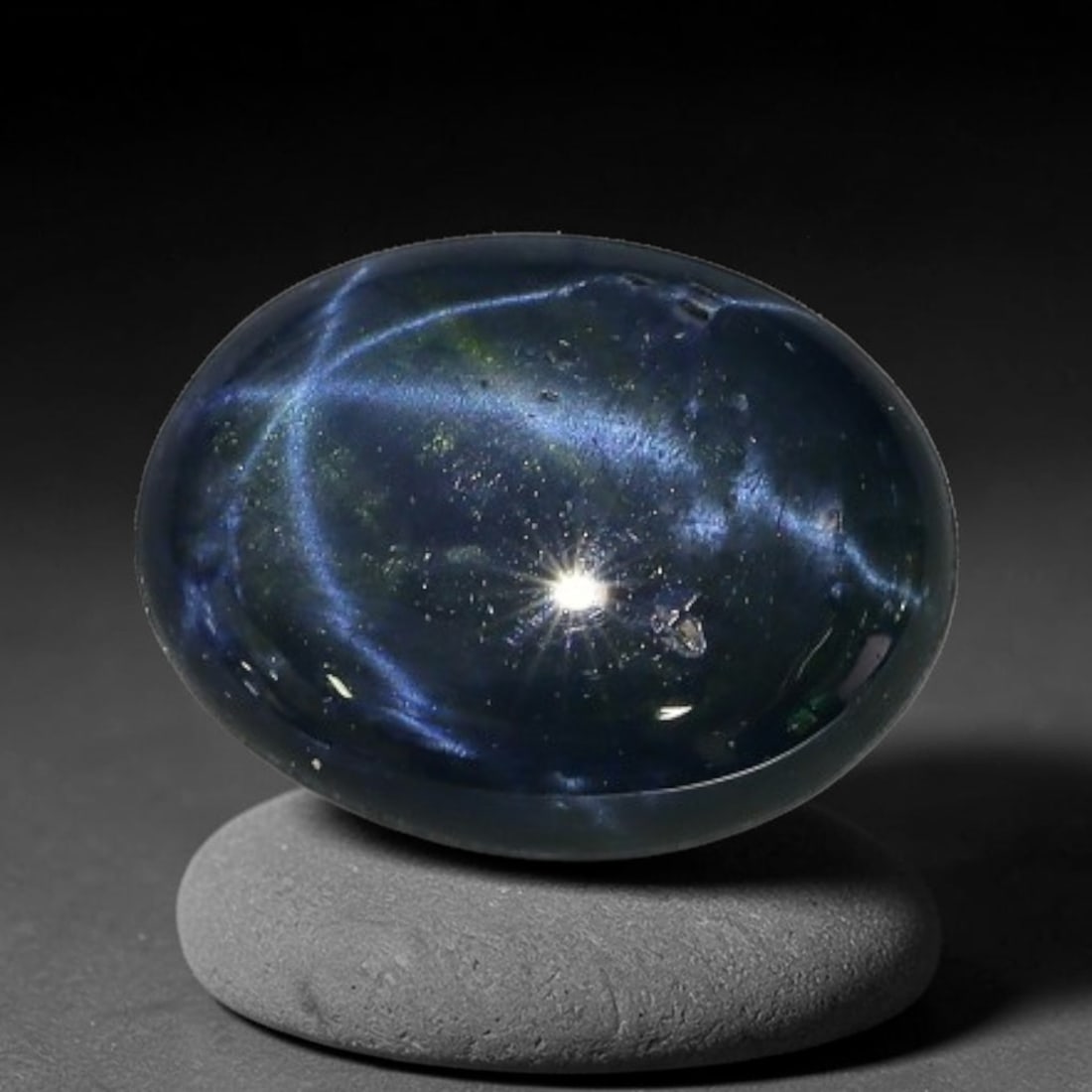 2.16 Carats Natural 6 Ray Blue Star Sapphire Loose Gemstone, 52XX: This star sapphire is crafted from natural corundum deposits and refined into a sleek polished cabochon form through professional lapidary finishing procedures. The distinct six-ray star asterism disp
