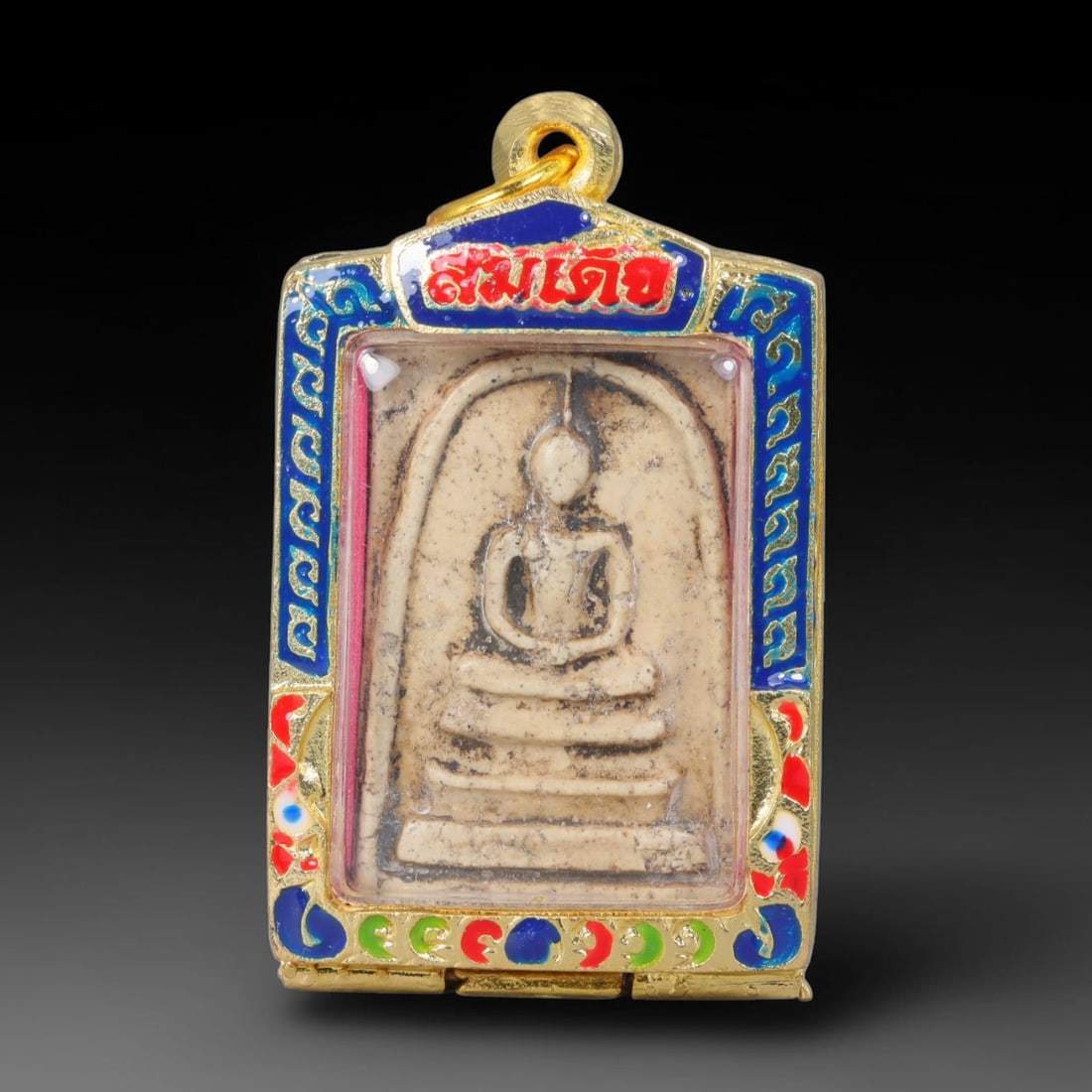 Thai Gilded Clay Metal Amulet Buddhist Votive Pendant, 10ZB: Constructed from fired clay with light gilded finishing layers, the piece uses traditional molded crafting techniques typical of Southeast Asian devotional artifacts. Its rectangular form follows stan