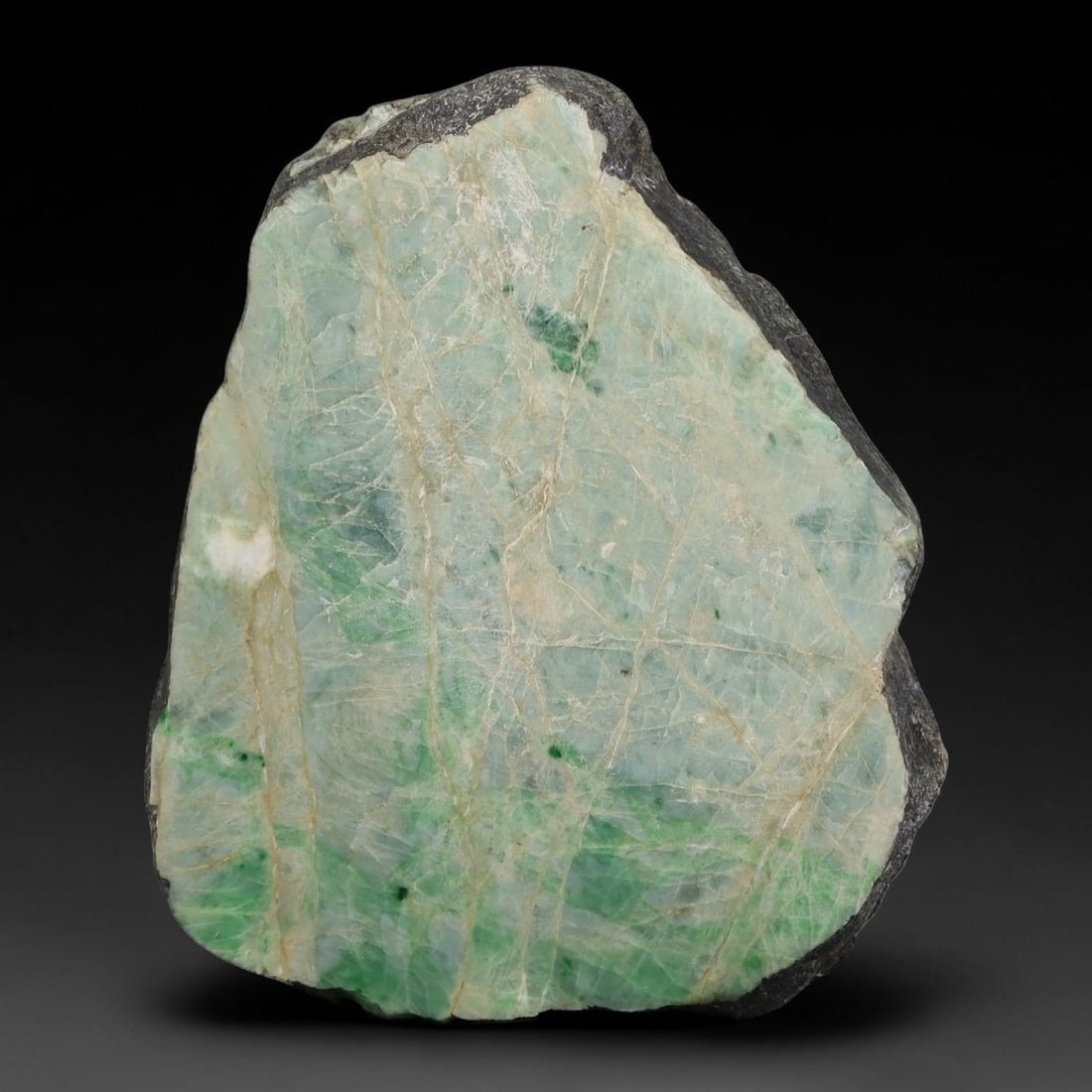 405ct Natural Type A Burmese Jadeite Jade Sliced Rough, 6YK: This specimen is a sliced rough block of natural Type A Burmese jadeite jade. The interior displays natural colour zoning with visible mineral veining and crystalline patterns typical of unprocessed j