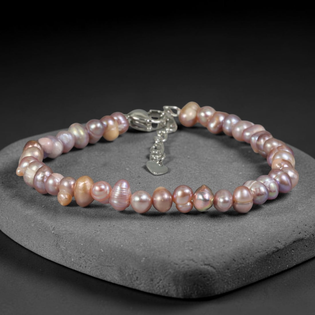 Natural Freshwater Pearl Bracelet - Tiny Baroque Lavender Pearl Strand, 80YM: Strung from miniature organic baroque natural freshwater pearls with blended lavender and soft peach iridescent overtones, each bead displaying highly varied miniature asymmetrical contours characteri
