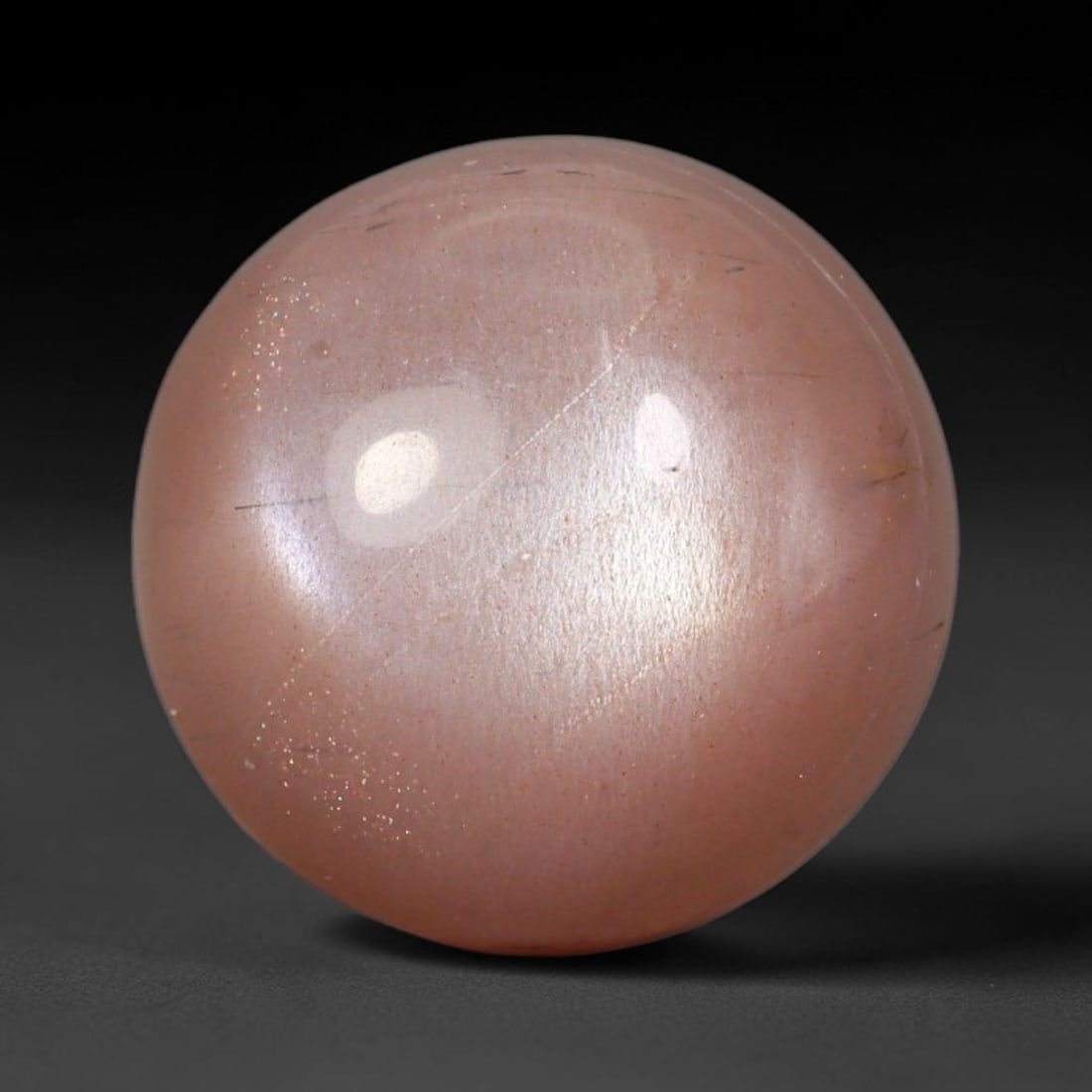 15.92 Carats Natural Ceylon Peach Moonstone Loose Gemstone, 51WJ: This natural Ceylon moonstone carries dimension measurements of 16.3x8.5mm, a premium feldspar mineral sourced from Ceylon's historic moonstone mining grounds celebrated for stones displaying characte