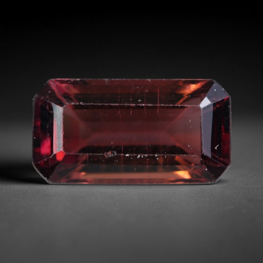 3.11 Carats Natural Deep Reddish Pink Tourmaline Emerald Faceted Loose Gemstone, 58WS: This classic emerald faceted tourmaline features rich deep reddish pink tone glowing through precise polished step facets, with minor natural fine internal lines and tiny mineral specks scattered insi