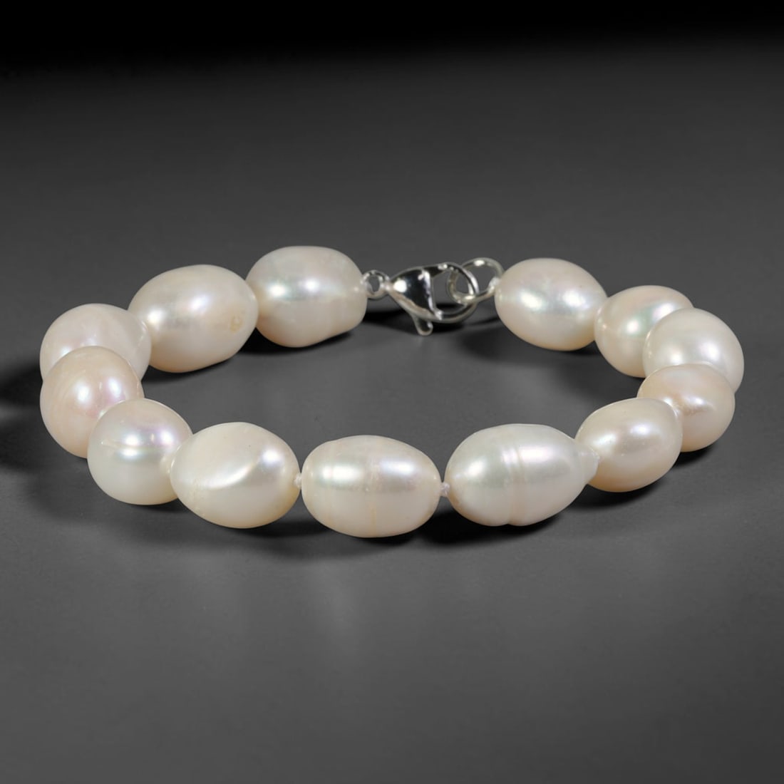 Natural Freshwater Pearl Bracelet - Oversized Baroque Glossy White Pearl Strand, 91YM: Crafted from large organic baroque natural freshwater pearls with high-gloss creamy white pearlescent luster, every bead features substantial asymmetrical oval contours formed by natural freshwater pe