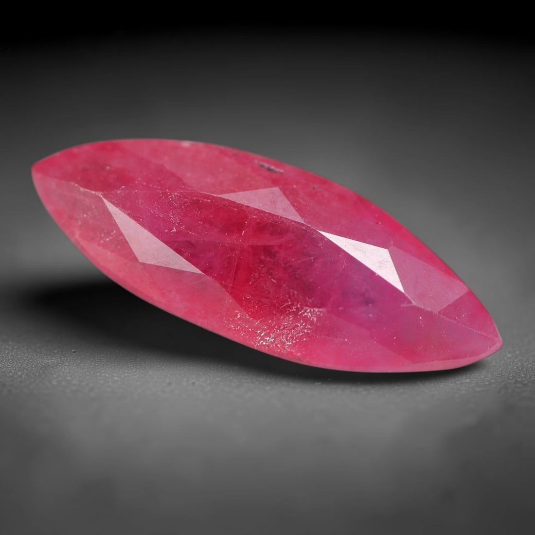 2.33 Carats Natural Orange Sapphire Marquise Faceted Loose Gemstone, 92XM: This natural orange sapphire is fashioned into an elongated marquise brilliant cut, presenting soft blended orange-pink tones inherent to natural corundum rough. Fine scattered mineral speckles, faint