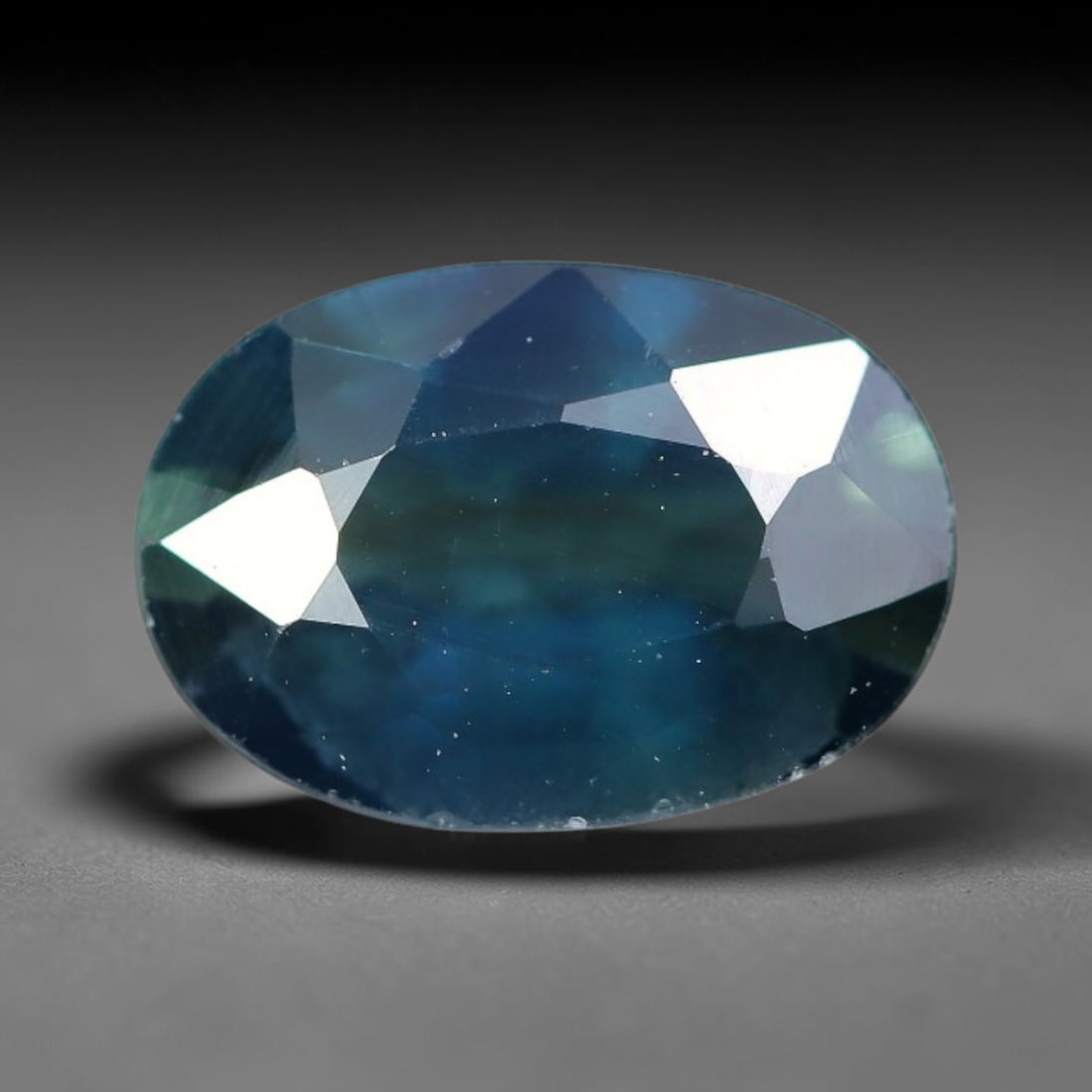 1.20 Carats Natural Royal Blue Oval Sapphire Gemstone, 5XZ: Come take a look at this sweet little natural sapphire all faceted and ready for setting work. It holds a rich, steady royal blue tone, deep and vivid just like a clear midday summer sky. This single 